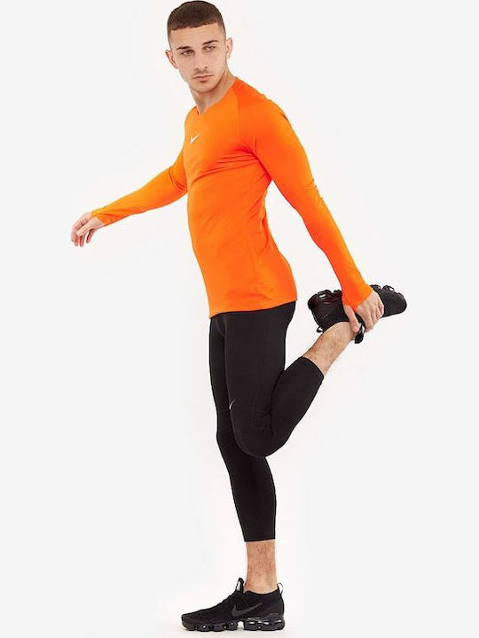 Nike First Layer Bluza Sportivă pentru Bărbați cu Mânecă Lungă Dri-Fit Portocalie