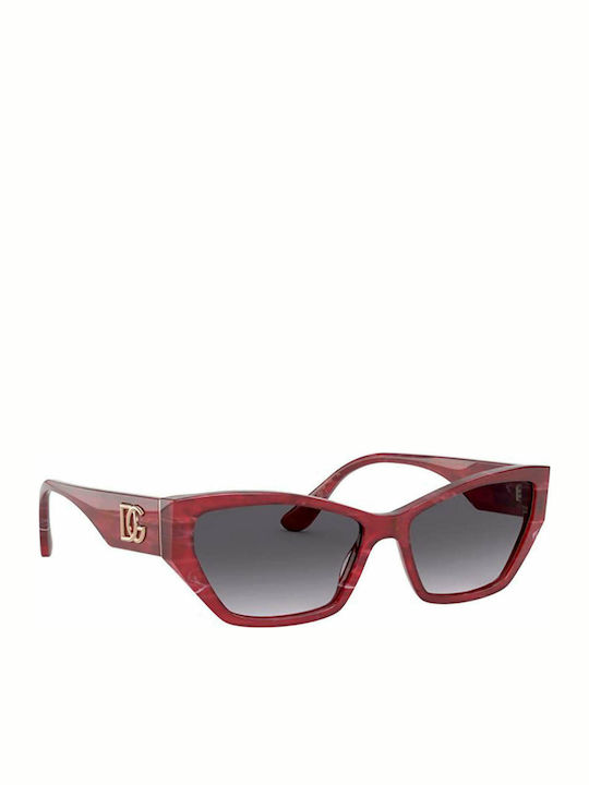 Dolce & Gabbana Sonnenbrillen Burgundisch mit Kunststoff Gestell