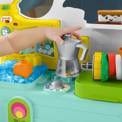 Fisher Price Vehicul Rulotă educativă 3 în 1 Smart Stages cu muzică pentru 9++ Luni