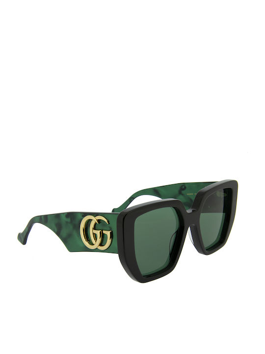 Gucci Damenträger Sonnenbrille mit Schwarzem Horn umrandetem Rahmen und Grünem Glas GG0956S