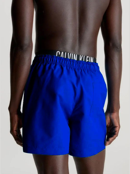 Calvin Klein Calvin Klein Calvin Klein Мъжки бански костюм със средна дължина в синьо Ruo с лого на компанията и ластик Km0km00992 C7n - Blue-Rua