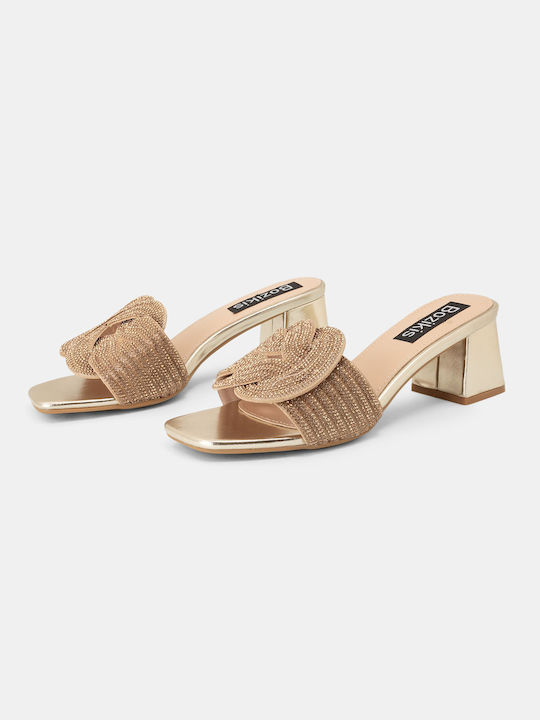 Bozikis Leder Mules mit Chunky Absatz in Gold Farbe