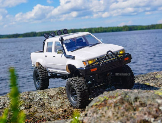 Wpl C64-1 RC Car Toyota Hilux Four-Wheel Drive Lifted 1/14 2.4g 4WD RTR Proportional Control White