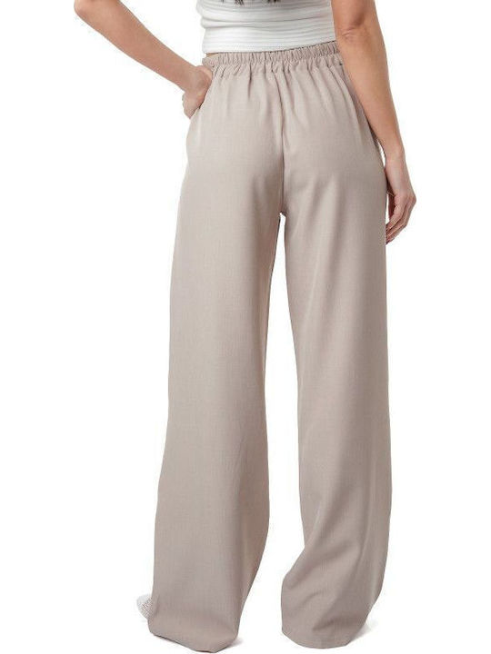 Beige Hose mit goldenen Verzierungen