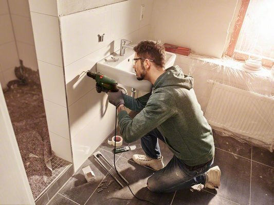 Bosch Easyimpact Schlag Bohrer 600W mit Koffer