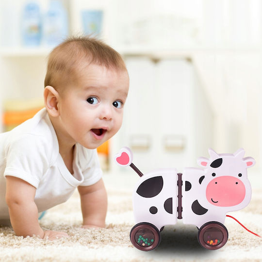 Jucărie Interactivă Văcuța Fericită Idealstore Dimensiune 18 X 19 X 9 Cm Dotată cu Frânghie Fabricată din Plastic de Înaltă Calitate Roți Acoperite cu Cauciuc Bile Umplute Poate Fi Separată în 2 Părți