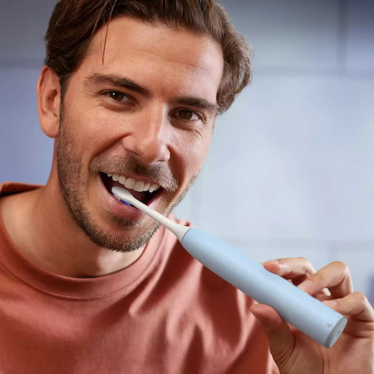 Philips Electric Toothbrush with Pressure Sensor and Travel Case HX7406/02 Light Blue