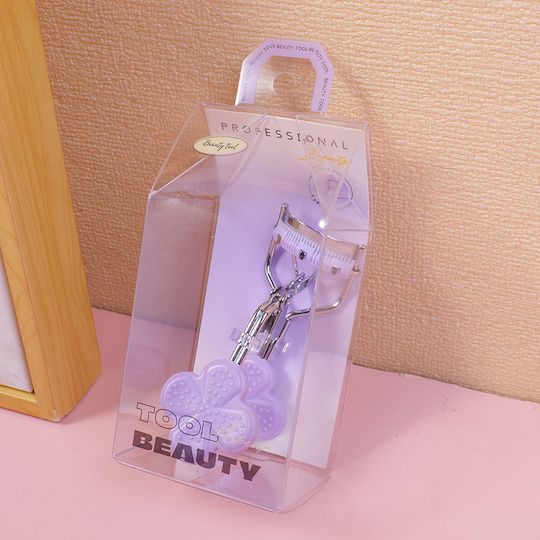 Wimpernschere Blumenmuster