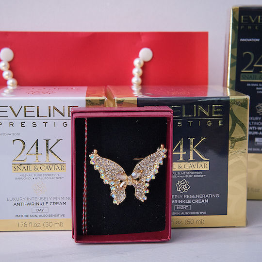 Tenderness Gift Set Butterfly Martisor Brooch Eveline Prestige Snail Caviar Anti-aging Day Cream 50 Ml Eveline Prestige Snail Caviar Face Serum In Elegant Handbag-style Pouch Red Gold