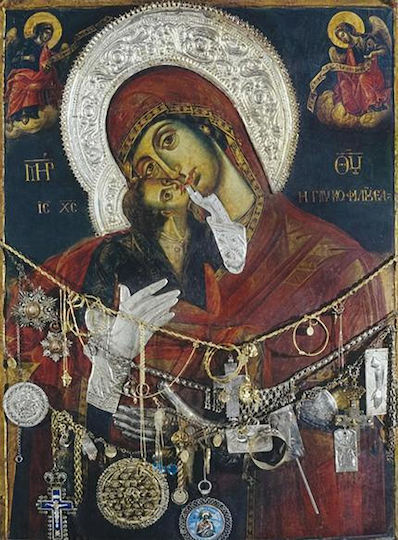Metal Offering Depiction Of Woman