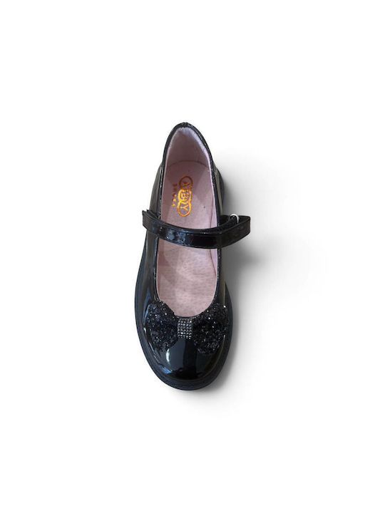 Kinder-Ballerinas mit Klettverschluss aus schwarzem Lackleder