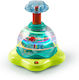Bright Starts Spinning Top Press & Glow Spinner cu Muzică, Lumină și Sunete pentru 6++ Luni