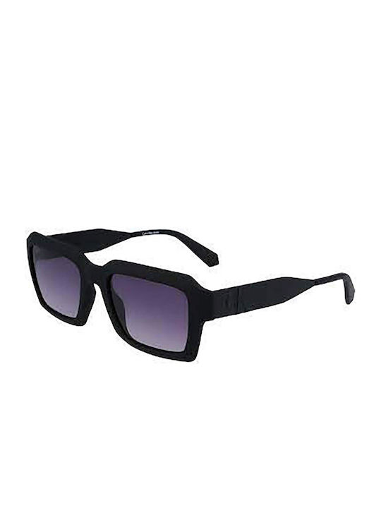 Calvin Klein Sonnenbrillen mit Schwarz Rahmen und Lila Verlaufsfarbe Linse CKJ23604S 002