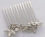 Metallic comb in silver color decorated with leaves and details with white strass