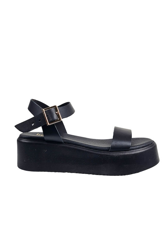 Sandale plate pentru femei din piele neagră cu cataramă aurie