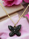 Stahl Gold Schmetterling Schwarzer Strass Halskette