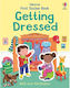 First Sticker Book Getting Dressed Usborne