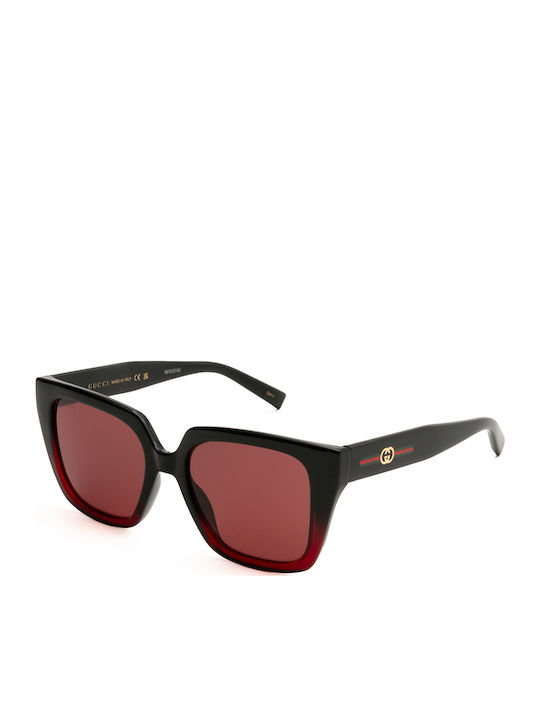 Gucci Women's Sunglasses with Black Horn-Rimmed...