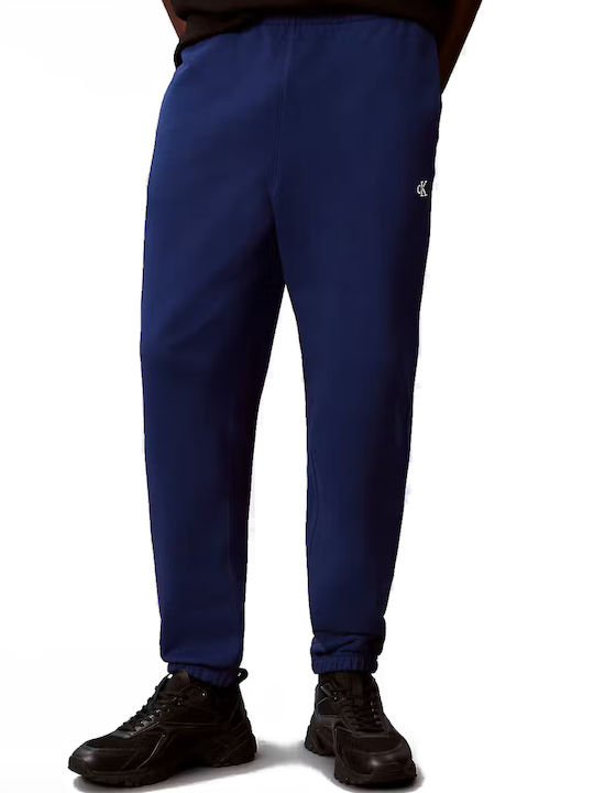 Calvin Klein Pantaloni de trening cu elastic Es...
