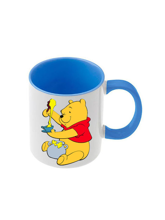 Winnie-Pooh-Tasse mit hellblauem Henkel und hel...